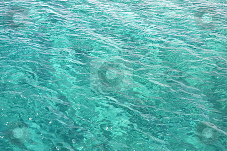 To use this stock image in your creative project, please select the size you need over to the right and click the "Add to Cart" button.
Your downloaded image will come with the Cutcaster watermark removed so don’t worry about the watermark you see on this page. Turquoise water stock photo, A photography of a turquoise ocean water by Markus Gann