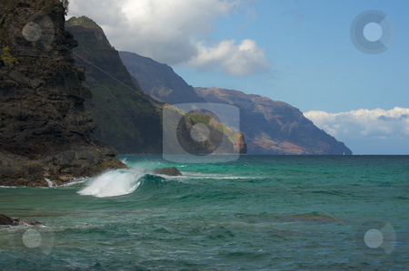 To use this stock image in your creative project, please select the size you need over to the right and click the "Add to Cart" button.
Your downloaded image will come with the Cutcaster watermark removed so don’t worry about the watermark you see on this page. Kauai's Napali Coastline stock photo, Kauai's Breathtaking Napali Coastline with crashing waves. by Andy Dean