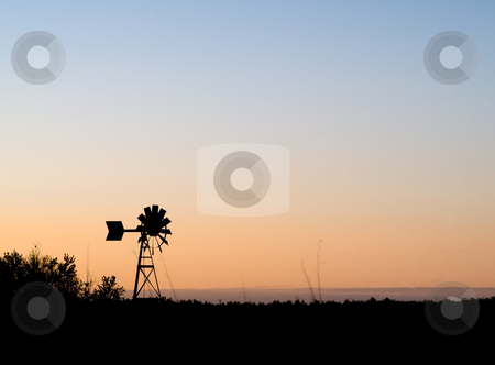 To use this stock image in your creative project, please select the size you need over to the right and click the "Add to Cart" button.
Your downloaded image will come with the Cutcaster watermark removed so don’t worry about the watermark you see on this page. Weather Vane Silhouette stock photo, A weather vane silhouette against a sunset by Richard Nelson