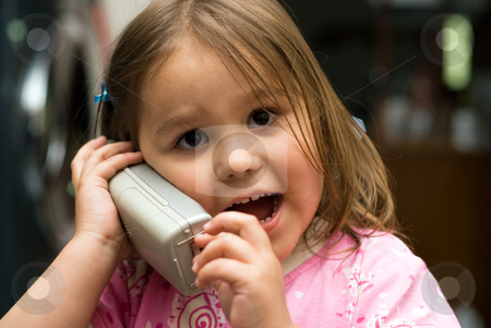 To use this stock image in your creative project, please select the size you need over to the right and click the "Add to Cart" button.
Your downloaded image will come with the Cutcaster watermark removed so don’t worry about the watermark you see on this page. Young Girl On The Phone stock photo, Little girl talking on the phone inside the house by Richard Nelson