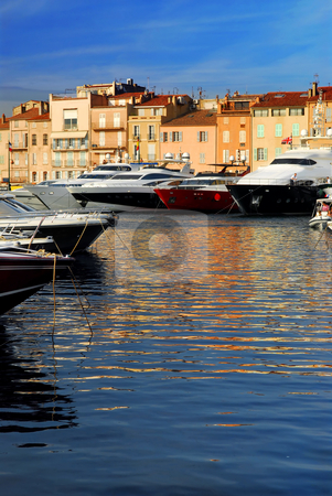 To use this stock image in your creative project, please select the size you need over to the right and click the "Add to Cart" button.
Your downloaded image will come with the Cutcaster watermark removed so don’t worry about the watermark you see on this page. Boats at St.Tropez stock photo, Luxury boats docked in St. Tropez in French Riviera by Elena Elisseeva