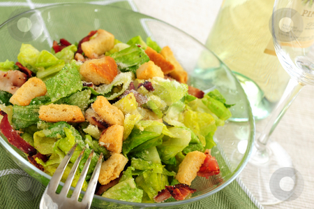 To use this stock image in your creative project, please select the size you need over to the right and click the "Add to Cart" button.
Your downloaded image will come with the Cutcaster watermark removed so don’t worry about the watermark you see on this page. Caesar salad stock photo, Caesar salad served in a glass bowl and white wine by Elena Elisseeva