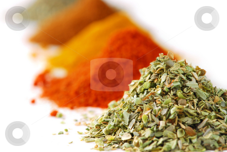To use this stock image in your creative project, please select the size you need over to the right and click the "Add to Cart" button.
Your downloaded image will come with the Cutcaster watermark removed so don’t worry about the watermark you see on this page. Spices stock photo, Heaps of various ground spices on white background by Elena Elisseeva