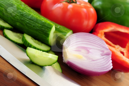 To use this stock image in your creative project, please select the size you need over to the right and click the "Add to Cart" button.
Your downloaded image will come with the Cutcaster watermark removed so don’t worry about the watermark you see on this page. Vegetables for salad stock photo, Fresh garden vegetables on cutting board - ingredients for a salad by Elena Elisseeva
