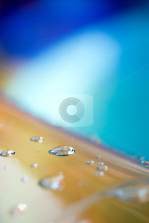 To use this stock image in your creative project, please select the size you need over to the right and click the "Add to Cart" button.
Your downloaded image will come with the Cutcaster watermark removed so don’t worry about the watermark you see on this page. Abstract macro of water on a pool stock photo, Abstract macro of water droplets on a child's inflatable swimming pool by Vince Clements