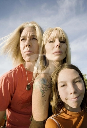 To use this stock image in your creative project, please select the size you need over to the right and click the "Add to Cart" button.
Your downloaded image will come with the Cutcaster watermark removed so don’t worry about the watermark you see on this page. Rock and Roll Family stock photo, Portrait of a three-member casual family by Scott Griessel