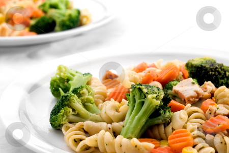 To use this stock image in your creative project, please select the size you need over to the right and click the "Add to Cart" button.
Your downloaded image will come with the Cutcaster watermark removed so don’t worry about the watermark you see on this page. Pasta and mixed vegetables stock photo, Two dishes of pasta with mixed vegatables by Vince Clements