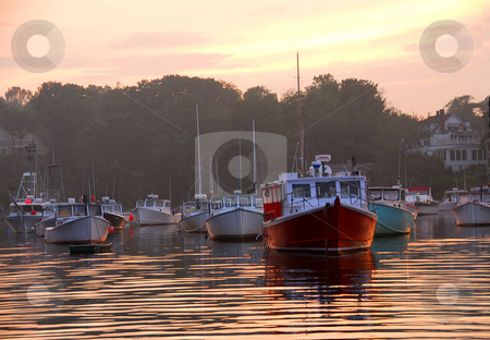 To use this stock image in your creative project, please select the size you need over to the right and click the "Add to Cart" button.
Your downloaded image will come with the Cutcaster watermark removed so don’t worry about the watermark you see on this page. Fishing boats at sunset stock photo, Fishing boats at sunset in Perkins Cove, Maine by Elena Elisseeva