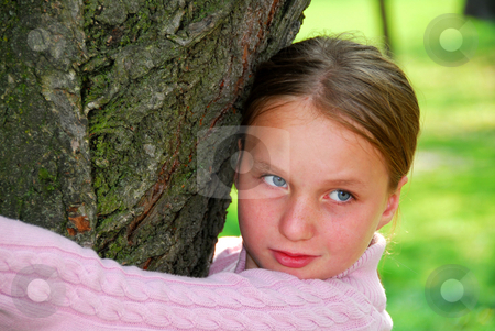 To use this stock image in your creative project, please select the size you need over to the right and click the "Add to Cart" button.
Your downloaded image will come with the Cutcaster watermark removed so don’t worry about the watermark you see on this page. Girl and big tree stock photo, Young girl standing near ancient big tree, closeup by Elena Elisseeva