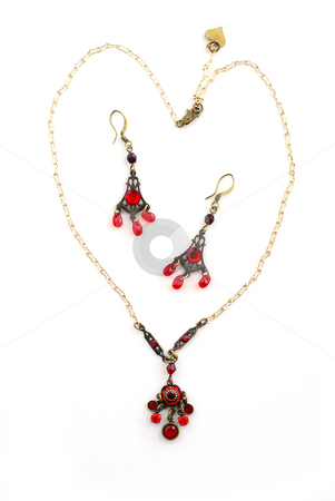 To use this stock image in your creative project, please select the size you need over to the right and click the "Add to Cart" button.
Your downloaded image will come with the Cutcaster watermark removed so don’t worry about the watermark you see on this page. Jewelry necklace earrings stock photo, Necklace and earrings on white background by Elena Elisseeva