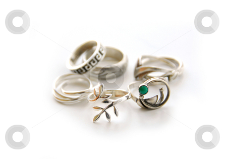 To use this stock image in your creative project, please select the size you need over to the right and click the "Add to Cart" button.
Your downloaded image will come with the Cutcaster watermark removed so don’t worry about the watermark you see on this page. Silver rings stock photo, Silver rings on white background by Elena Elisseeva