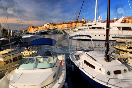 To use this stock image in your creative project, please select the size you need over to the right and click the "Add to Cart" button.
Your downloaded image will come with the Cutcaster watermark removed so don’t worry about the watermark you see on this page. Boats at St.Tropez stock photo, Luxury boats docked in St. Tropez in French Riviera by Elena Elisseeva