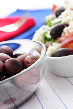 To use this stock image in your creative project, please select the size you need over to the right and click the "Add to Cart" button.
Your downloaded image will come with the Cutcaster watermark removed so don’t worry about the watermark you see on this page. Olives and greek salad stock photo, Black kalamata olives and greek salad with feta cheese by Elena Elisseeva