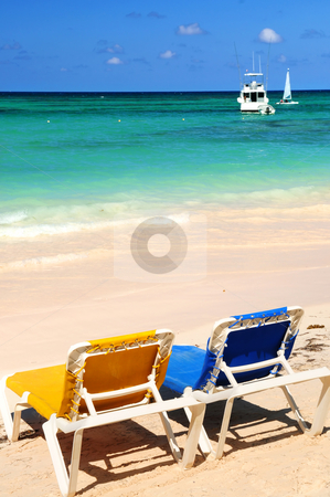 To use this stock image in your creative project, please select the size you need over to the right and click the "Add to Cart" button.
Your downloaded image will come with the Cutcaster watermark removed so don’t worry about the watermark you see on this page. Chairs on sandy tropical beach stock photo, Two vacation chairs on sandy tropical beach of Caribbean island by Elena Elisseeva
