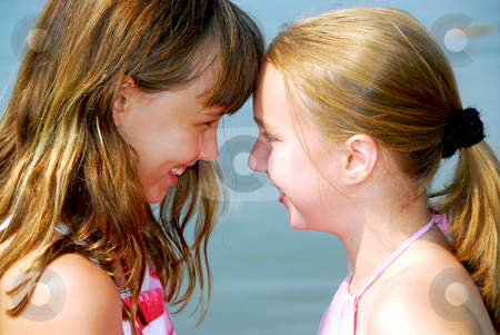 To use this stock image in your creative project, please select the size you need over to the right and click the "Add to Cart" button.
Your downloaded image will come with the Cutcaster watermark removed so don’t worry about the watermark you see on this page. Two girlfriends stock photo, Portrait of two young happy girls by Elena Elisseeva