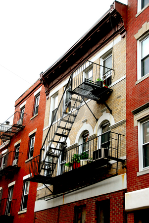 To use this stock image in your creative project, please select the size you need over to the right and click the "Add to Cart" button.
Your downloaded image will come with the Cutcaster watermark removed so don’t worry about the watermark you see on this page. Boston houses stock photo, Row of brick houses in Boston historical North End metal fire escapes by Elena Elisseeva