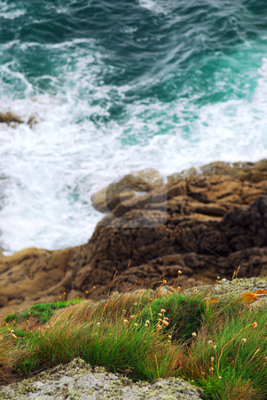 To use this stock image in your creative project, please select the size you need over to the right and click the "Add to Cart" button.
Your downloaded image will come with the Cutcaster watermark removed so don’t worry about the watermark you see on this page. Brittany coast stock photo, Looking down a cliff onto stormy ocean at the rocky coast of Brittany, France by Elena Elisseeva
