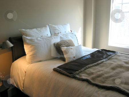 To use this stock image in your creative project, please select the size you need over to the right and click the "Add to Cart" button.
Your downloaded image will come with the Cutcaster watermark removed so don’t worry about the watermark you see on this page. Bedroom interior stock photo, Modern bedroom interior by Elena Elisseeva