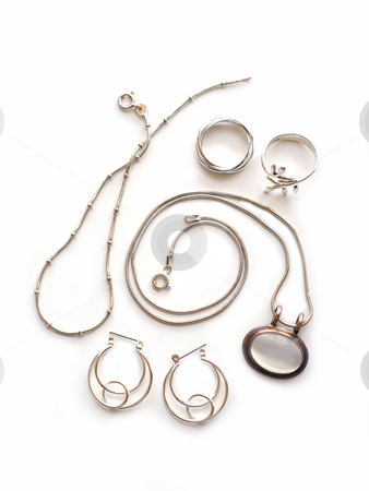 To use this stock image in your creative project, please select the size you need over to the right and click the "Add to Cart" button.
Your downloaded image will come with the Cutcaster watermark removed so don’t worry about the watermark you see on this page. Silver jewelry stock photo, Silver jewelry on white background by Elena Elisseeva