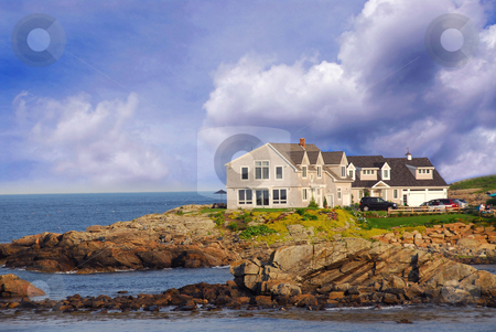 To use this stock image in your creative project, please select the size you need over to the right and click the "Add to Cart" button.
Your downloaded image will come with the Cutcaster watermark removed so don’t worry about the watermark you see on this page. House on ocean shore stock photo, House on ocean shore in Maine, USA by Elena Elisseeva