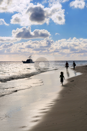 To use this stock image in your creative project, please select the size you need over to the right and click the "Add to Cart" button.
Your downloaded image will come with the Cutcaster watermark removed so don’t worry about the watermark you see on this page. Family walking on a beach stock photo, Family taking a walk on a sandy beach of tropical resort at sunset by Elena Elisseeva