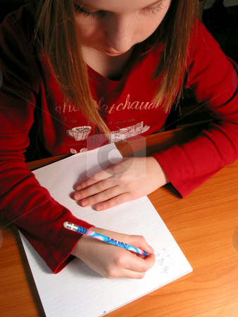 To use this stock image in your creative project, please select the size you need over to the right and click the "Add to Cart" button.
Your downloaded image will come with the Cutcaster watermark removed so don’t worry about the watermark you see on this page. Girl study homework stock photo, Young girl studying, homework by Elena Elisseeva