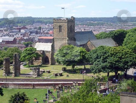 To use this stock image in your creative project, please select the size you need over to the right and click the "Add to Cart" button.
Your downloaded image will come with the Cutcaster watermark removed so don’t worry about the watermark you see on this page. Saint Marys Church Scarborough stock photo, Saint Marys Church and graveyard, Scarborough, England. by Martin Crowdy