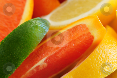 To use this stock image in your creative project, please select the size you need over to the right and click the "Add to Cart" button.
Your downloaded image will come with the Cutcaster watermark removed so don’t worry about the watermark you see on this page. Citrus wedges stock photo, Wedges of assorted citrus fruits lemon orange and lime by Elena Elisseeva