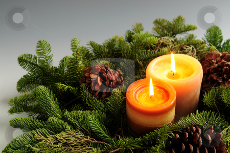 To use this stock image in your creative project, please select the size you need over to the right and click the "Add to Cart" button.
Your downloaded image will come with the Cutcaster watermark removed so don’t worry about the watermark you see on this page. Christmas candles stock photo, Christmas arrangement of burning candles and green spruce branches by Elena Elisseeva