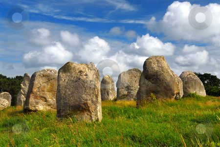 To use this stock image in your creative project, please select the size you need over to the right and click the "Add to Cart" button.
Your downloaded image will come with the Cutcaster watermark removed so don’t worry about the watermark you see on this page. Megalithic monuments in Brittany stock photo, Prehistoric megalithic monuments menhirs in Carnac area in Brittany, France by Elena Elisseeva