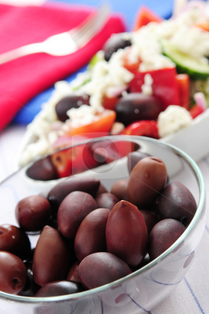 To use this stock image in your creative project, please select the size you need over to the right and click the "Add to Cart" button.
Your downloaded image will come with the Cutcaster watermark removed so don’t worry about the watermark you see on this page. Olives and greek salad stock photo, Black kalamata olives and greek salad with feta cheese by Elena Elisseeva