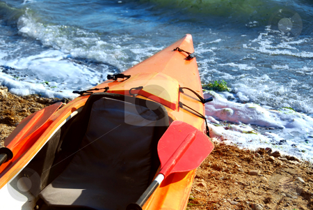 To use this stock image in your creative project, please select the size you need over to the right and click the "Add to Cart" button.
Your downloaded image will come with the Cutcaster watermark removed so don’t worry about the watermark you see on this page. Kayak stock photo, Orange kayak on a sandy shore of a river by Elena Elisseeva