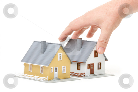 To use this stock image in your creative project, please select the size you need over to the right and click the "Add to Cart" button.
Your downloaded image will come with the Cutcaster watermark removed so don’t worry about the watermark you see on this page. Choosing A Home stock photo, Male hand reaching for house isolated on a white background. by Andy Dean