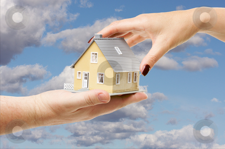 To use this stock image in your creative project, please select the size you need over to the right and click the "Add to Cart" button.
Your downloaded image will come with the Cutcaster watermark removed so don’t worry about the watermark you see on this page. Reaching For A Home stock photo, Female hand reaching for a house on a partly cloudy sky background. by Andy Dean