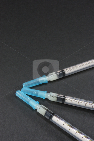 To use this stock image in your creative project, please select the size you need over to the right and click the "Add to Cart" button.
Your downloaded image will come with the Cutcaster watermark removed so don’t worry about the watermark you see on this page. Syringe stock photo, by Jessica Tooley