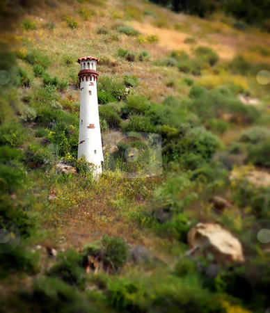 To use this stock image in your creative project, please select the size you need over to the right and click the "Add to Cart" button.
Your downloaded image will come with the Cutcaster watermark removed so don’t worry about the watermark you see on this page. Laguna Beach Light Tower stock photo, Small white light tower in Laguna Beach California by Henrik Lehnerer