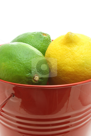 To use this stock image in your creative project, please select the size you need over to the right and click the "Add to Cart" button.
Your downloaded image will come with the Cutcaster watermark removed so don’t worry about the watermark you see on this page. Cheerful Citrus stock photo, Close up of two limes and one lemon in a red bucket, isolated on white. by Jessica Tooley