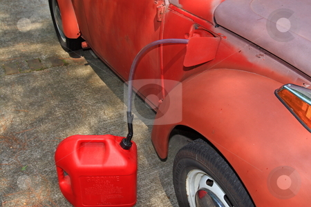 To use this stock image in your creative project, please select the size you need over to the right and click the "Add to Cart" button.
Your downloaded image will come with the Cutcaster watermark removed so don’t worry about the watermark you see on this page. Gas Theft stock photo, With the Gas prices reaching to the all time high of 3.97 in the Atlanta Ga area gas theft of the older cars with out locking gas doors is on the raise by Jack Schiffer