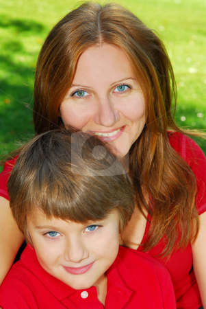 To use this stock image in your creative project, please select the size you need over to the right and click the "Add to Cart" button.
Your downloaded image will come with the Cutcaster watermark removed so don’t worry about the watermark you see on this page. Mother and son stock photo, Portrait of smiling mother and son in summer park by Elena Elisseeva