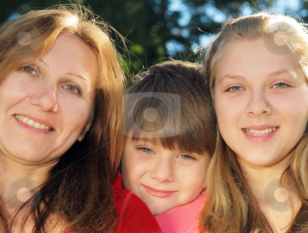 To use this stock image in your creative project, please select the size you need over to the right and click the "Add to Cart" button.
Your downloaded image will come with the Cutcaster watermark removed so don’t worry about the watermark you see on this page. Family portrait stock photo, Portrait of a smiling family of mother and her children by Elena Elisseeva