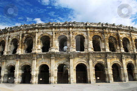 To use this stock image in your creative project, please select the size you need over to the right and click the "Add to Cart" button.
Your downloaded image will come with the Cutcaster watermark removed so don’t worry about the watermark you see on this page. Roman arena in Nimes France stock photo, Roman arena in city of Nimes in southern France by Elena Elisseeva