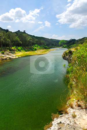 To use this stock image in your creative project, please select the size you need over to the right and click the "Add to Cart" button.
Your downloaded image will come with the Cutcaster watermark removed so don’t worry about the watermark you see on this page. River Gard in southern France stock photo, River Gard in southern France near Nimes by Elena Elisseeva