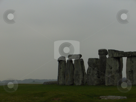 To use this stock image in your creative project, please select the size you need over to the right and click the "Add to Cart" button.
Your downloaded image will come with the Cutcaster watermark removed so don’t worry about the watermark you see on this page. Stonehenge stock photo, Stonehenge on a grey winter day. by Jessica Tooley