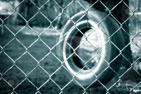 To use this stock image in your creative project, please select the size you need over to the right and click the "Add to Cart" button.
Your downloaded image will come with the Cutcaster watermark removed so don’t worry about the watermark you see on this page. If Only... stock photo, A tire swing hangs from a tree with a chain link fence blocking the way. by Nathan Smith