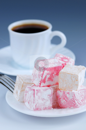 To use this stock image in your creative project, please select the size you need over to the right and click the "Add to Cart" button.
Your downloaded image will come with the Cutcaster watermark removed so don’t worry about the watermark you see on this page. Turkish delight stock photo, Turkish delight (lokum) confection with black coffee by Elena Elisseeva
