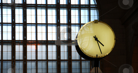 To use this stock image in your creative project, please select the size you need over to the right and click the "Add to Cart" button.
Your downloaded image will come with the Cutcaster watermark removed so don’t worry about the watermark you see on this page. Clock train station stock photo, Big clock inside a train station with big window by Elena Elisseeva