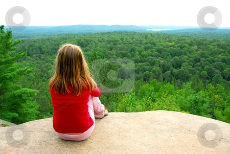 To use this stock image in your creative project, please select the size you need over to the right and click the "Add to Cart" button.
Your downloaded image will come with the Cutcaster watermark removed so don’t worry about the watermark you see on this page. Girl edge cliff stock photo, Young girl sitting on an edge of a cliff by Elena Elisseeva