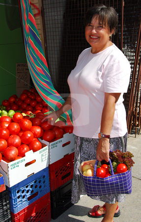 To use this stock image in your creative project, please select the size you need over to the right and click the "Add to Cart" button.
Your downloaded image will come with the Cutcaster watermark removed so don’t worry about the watermark you see on this page. Buying vegetables stock photo, Attractive mature woman buying vegetables at farmer's market by Elena Elisseeva