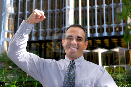 To use this stock image in your creative project, please select the size you need over to the right and click the "Add to Cart" button.
Your downloaded image will come with the Cutcaster watermark removed so don’t worry about the watermark you see on this page. Businessman truimph stock photo, Triumphant businessman in the city raising an arm in victory by Elena Elisseeva