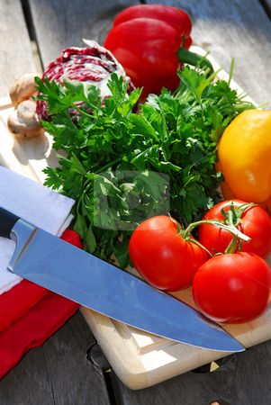 To use this stock image in your creative project, please select the size you need over to the right and click the "Add to Cart" button.
Your downloaded image will come with the Cutcaster watermark removed so don’t worry about the watermark you see on this page. Fresh vegetables stock photo, Assorted fresh vegetables on cutting board on rustic table by Elena Elisseeva